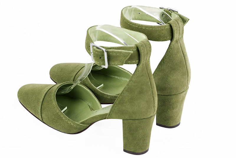 Pistachio green women's open side shoes, with a strap around the ankle. Round toe. Medium block heels. Rear view - Florence KOOIJMAN